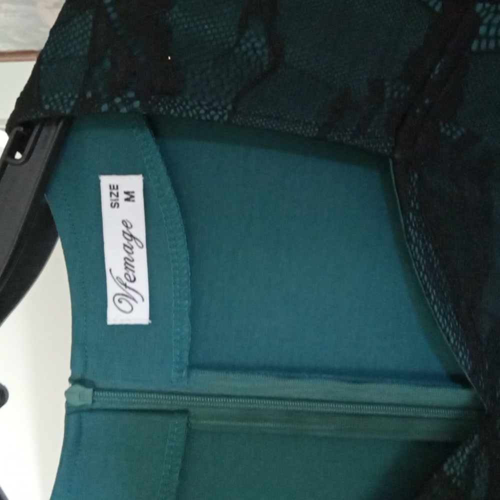Elegant Teal Dress with Black Lace Sleeves and Floral Accents - Picture 2 of 3